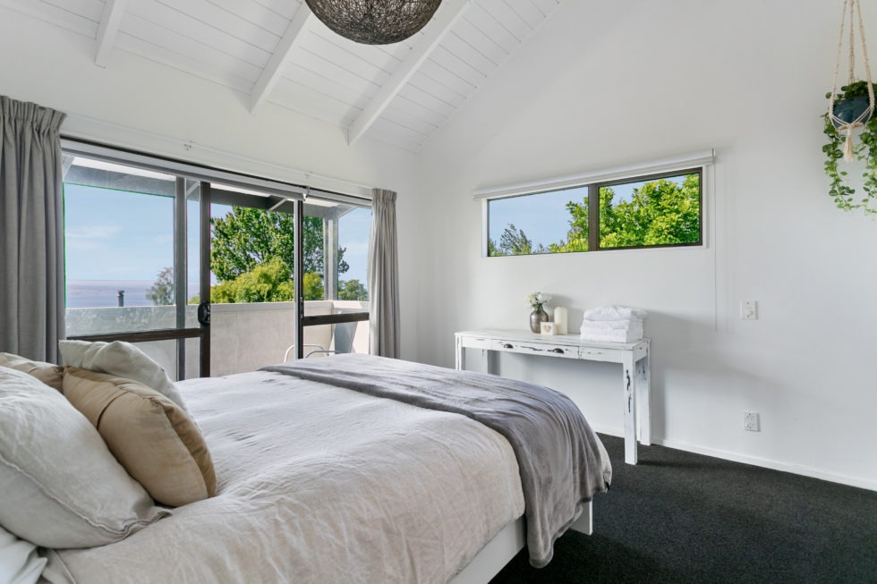 Guest bedroom overlooking the lake